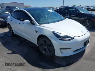 2023 Tesla Model 3 z VIN 5YJ3E1EA0PF608506, wystawiony jako IAAI lot #41748862 z przebiegiem 15 mil mil oraz . Historia ofert i sprzedaży dostępna na DreamBid. Obrazek 1.