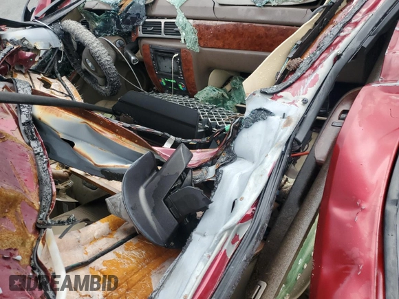 2009 Chevrolet Tahoe LTZ with VIN 1GNFK33009R128434, listed as a Copart auction lot 57104225 with Not provided miles and Salvage title. Bid and sale history available at DreamBid. Image 8.
