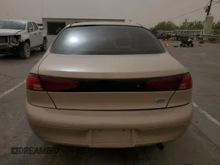 1999 Ford Escort LX z VIN 1FAFP10P2XW132084, wystawiony jako Copart lot #53642945 z przebiegiem 142 227 mil mil oraz Szkody całkowita. Historia ofert i sprzedaży dostępna na DreamBid. Obrazek 6.