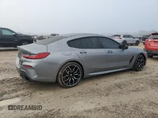 2023 BMW 8 Series M850i z VIN WBAGV8C02PCL20503, wystawiony jako Copart lot #84214214 z przebiegiem Nie podano mil oraz Szkoda całkowita • Salvage title. Historia ofert i sprzedaży dostępna na DreamBid. Obrazek 3.