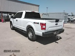2018 Ford F-150 XL with VIN 1FTFX1EG9JKE26325, listed as a IAAI auction lot 42308203 with 123,818 mi miles and . Bid and sale history available at DreamBid. Image 1.