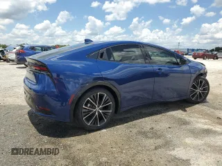 2024 Toyota Prius LE with VIN JTDADABU9R3012478, listed as a Copart auction lot 60652895 with 6,859 mi miles and Salvage title. Bid and sale history available at DreamBid. Image 3.