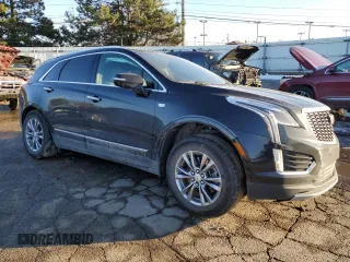 2021 Cadillac XT5 AWD Premium Luxury with VIN 1GYKNDRS6MZ111640, listed as a Copart auction lot 46567035 with 57,484 mi miles and Salvage Title. Bid and sale history available at DreamBid. Image 4.
