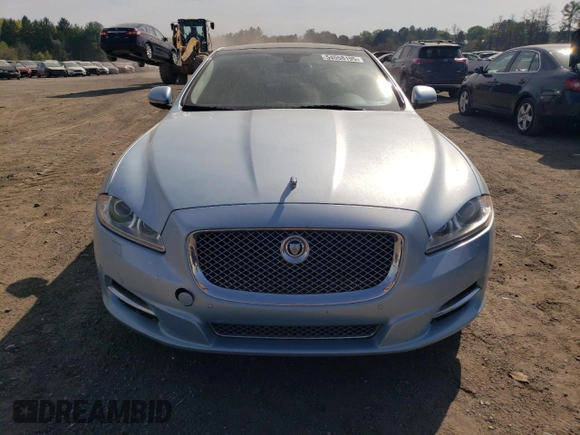 2013 Jaguar XJ Portfolio with VIN SAJWJ2GD3D8V47879, listed as a Copart auction lot 54558195 with 99,500 mi miles and Clean Title. Bid and sale history available at DreamBid. Image 5.