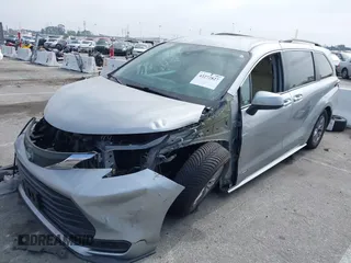 2021 Toyota Sienna LE with VIN 5TDKRKEC5MS010782, listed as a IAAI auction lot 42272827 with 196,844 mi miles and . Bid and sale history available at DreamBid. Image 17.