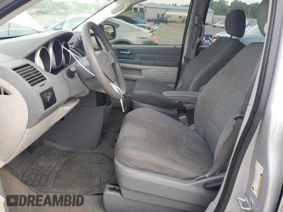 2009 Dodge Grand Caravan SE z VIN 2D8HN44E29R591969, wystawiony jako Copart lot #64255535 z przebiegiem 154 214 mil mil oraz Szkoda całkowita • Salvage title. Historia ofert i sprzedaży dostępna na DreamBid. Obrazek 7.