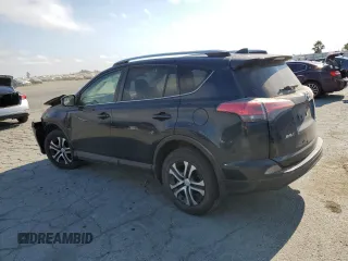 2017 Toyota RAV4 LE with VIN JTMBFREVXHJ146587, listed as a Copart auction lot 64794935 with 92,192 mi miles and Salvage title. Bid and sale history available at DreamBid. Image 2.