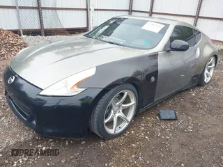 2009 Nissan 370Z Touring with VIN JN1AZ44E69M404341, listed as a IAAI auction lot 41907551 with 144,612 mi miles and . Bid and sale history available at DreamBid. Image 17.