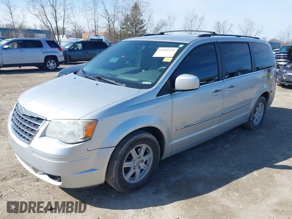 2010 Chrysler Town & Country Touring with VIN 2A4RR5D19AR450132, listed as a IAAI auction lot 41951121 with 283,451 mi miles. Bid and sale history available at carsss.com. Image 2.