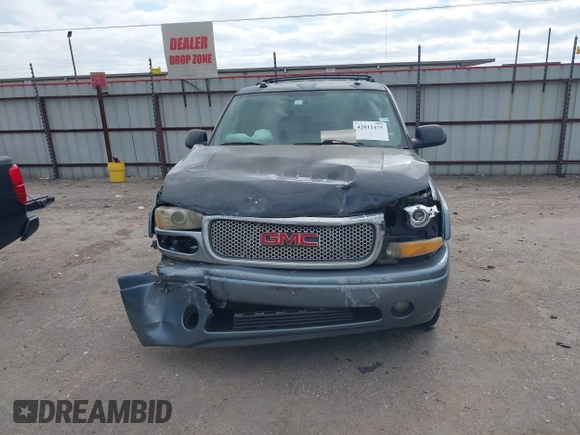 2004 GMC Yukon SLT z VIN 1GKEC13Z44J310511, wystawiony jako IAAI lot #42011475 z przebiegiem 218 746 mil mil oraz . Historia ofert i sprzedaży dostępna na DreamBid. Obrazek 6.