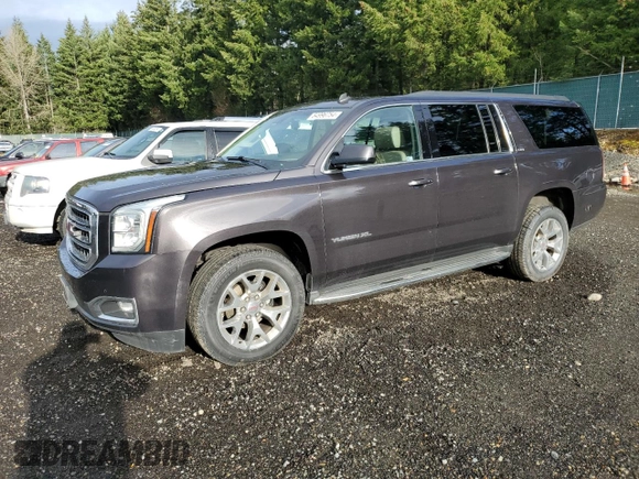 2015 GMC Yukon XL SLT with VIN 1GKS2HKC7FR282543, listed as a Copart auction lot 84996754 with 153,840 mi miles and Clean Title. Bid and sale history available at carsss.com. Image 1.