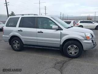 2004 Honda Pilot EX with VIN 2HKYF18644H596075, listed as a IAAI auction lot 41093500 with 92,952 mi miles. Bid and sale history available at carsss.com. Image 13.