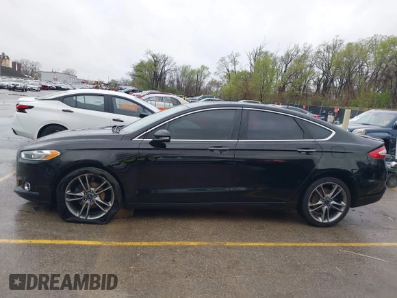 2016 Ford Fusion Titanium with VIN 3FA6P0K90GR273795, listed as a IAAI auction lot 41931175 with 108,531 mi miles and . Bid and sale history available at carsss.com. Image 14.