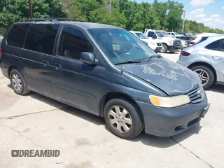 2004 Honda Odyssey EX-L z VIN 5FNRL18974B059223, wystawiony jako IAAI lot #42249508 z przebiegiem 247 856 mil mil oraz . Historia ofert i sprzedaży dostępna na DreamBid. Obrazek 1.