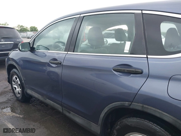 2014 Honda CR-V LX with VIN 3CZRM3H39EG703959, listed as a IAAI auction lot 41990964 with 87,424 mi miles. Bid and sale history available at carsss.com. Image 14.