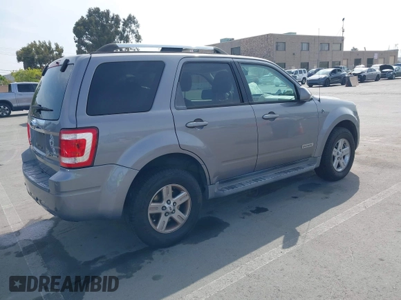 2008 Ford Escape Hybrid with VIN 1FMCU49H78KE79028, listed as a IAAI auction lot 42142396 with 131,642 mi miles and . Bid and sale history available at DreamBid. Image 4.