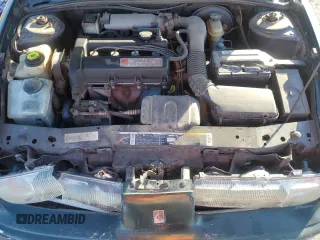 1996 Saturn SL with VIN 1G8ZK5272TZ137198, listed as a Copart auction lot 72446614 with 99,586 mi miles and Salvage title. Bid and sale history available at DreamBid. Image 12.
