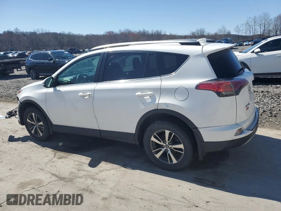2018 Toyota RAV4 XLE with VIN 2T3RFREV8JW750032, listed as a Copart auction lot 53676475 with Not Provided miles and Salvage Title. Bid and sale history available at DreamBid. Image 2.
