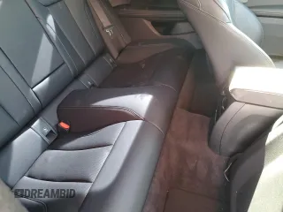 2023 BMW 4 Series 430i with VIN WBA53AP00PCL19557, listed as a Copart auction lot 55710174 with 14,982 mi miles and Salvage title. Bid and sale history available at DreamBid. Image 10.