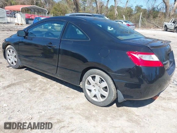 2009 Honda Civic Cpe LX with VIN 2HGFG12669H509744, listed as a IAAI auction lot 41777731 with 202,530 mi miles. Bid and sale history available at carsss.com. Image 3.