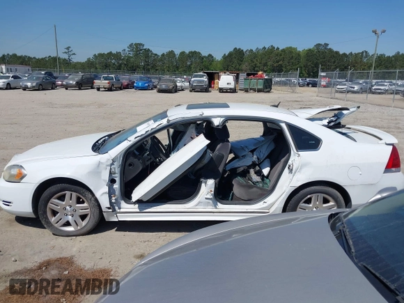 2014 Chevrolet Impala LT with VIN 2G1WB5E30E1136153, listed as a IAAI auction lot 39848599 with 126,676 mi miles and . Bid and sale history available at DreamBid. Image 14.