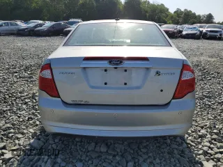 2010 Ford Fusion Hybrid z VIN 3FADP0L31AR150886, wystawiony jako Copart lot #57517255 z przebiegiem 170 137 mil mil oraz Szkoda całkowita • Salvage title. Historia ofert i sprzedaży dostępna na DreamBid. Obrazek 6.