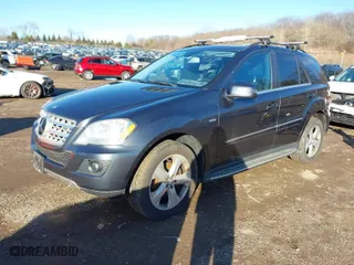 2011 Mercedes-Benz M-Class ML 350 BlueTEC with VIN 4JGBB2FB8BA735003, listed as a IAAI auction lot 41753013 with 119,258 mi miles. Bid and sale history available at carsss.com. Image 2.