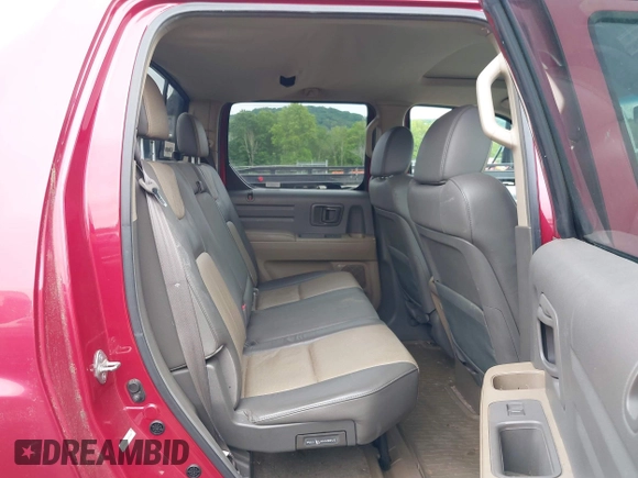 2006 Honda Ridgeline RTL z VIN 2HJYK16566H521231, wystawiony jako IAAI lot #42361545 z przebiegiem 202 283 mil mil oraz . Historia ofert i sprzedaży dostępna na DreamBid. Obrazek 8.