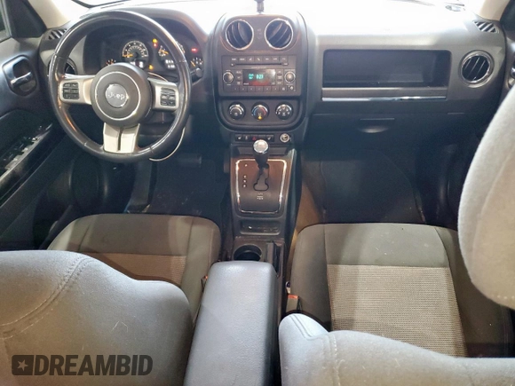 2015 Jeep Patriot Latitude with VIN 1C4NJPFB5FD263798, listed as a Copart auction lot 59739195 with 61,927 mi miles and Clean title. Bid and sale history available at DreamBid. Image 8.