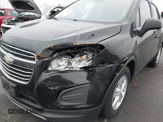 2015 Chevrolet Trax LT with VIN KL7CJLSBXFB057679, listed as a IAAI auction lot 41716489 with 97,468 mi miles. Bid and sale history available at carsss.com. Image 6.
