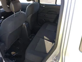 2011 Jeep Patriot Latitude with VIN 1J4NT1GA3BD220000, listed as a IAAI auction lot 41703041 with 138,945 mi miles. Bid and sale history available at carsss.com. Image 8.