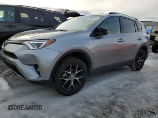 2018 Toyota RAV4 Hybrid SE with VIN JTMJJREV0JD246230, listed as a Copart auction lot 89095135 with Not provided miles and Salvage title. Bid and sale history available at DreamBid. Image 1.