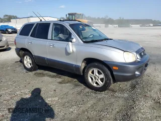 2003 Hyundai Santa Fe GLS with VIN KM8SC13E93U521854, listed as a Copart auction lot 74481814 with 242,069 mi miles and Salvage Title. Bid and sale history available at carsss.com. Image 4.