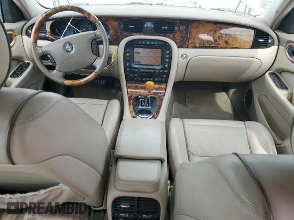 2004 Jaguar XJ Vanden Plas with VIN SAJWA74C04SG25291, listed as a Copart auction lot 56678255 with 176,597 mi miles and Clean Title. Bid and sale history available at DreamBid. Image 8.