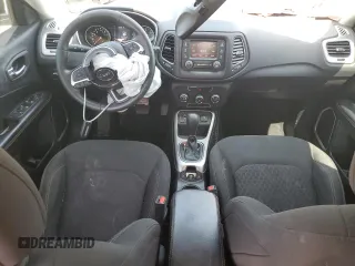 2018 Jeep Compass Sport with VIN 3C4NJCABXJT105430, listed as a Copart auction lot 59237575 with 104,600 mi miles and Salvage title. Bid and sale history available at DreamBid. Image 8.