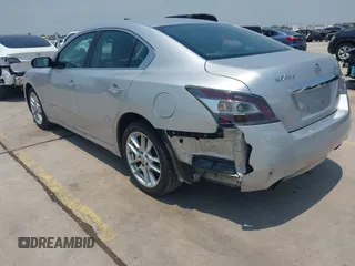 2014 Nissan Maxima SV with VIN 1N4AA5AP5EC464620, listed as a IAAI auction lot 42267412 with 147,129 mi miles and . Bid and sale history available at DreamBid. Image 3.
