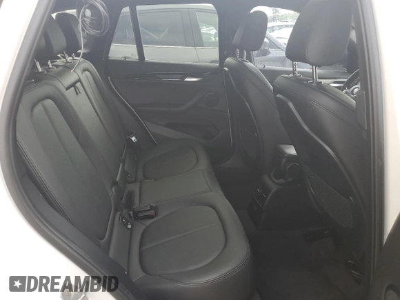 2019 BMW X1 xDrive28i with VIN WBXHT3C52K3H34021, listed as a Copart auction lot 64032535 with 30,752 mi miles and Salvage title. Bid and sale history available at DreamBid. Image 10.