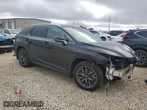 2022 Lexus RX with VIN 2T2YZMDA2NC344974, listed as a Copart auction lot 84971184 with 19,908 mi miles and Salvage Title. Bid and sale history available at carsss.com. Image 4.