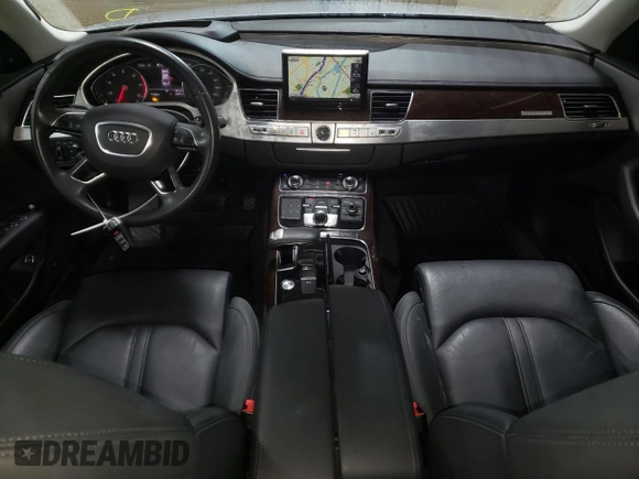 2015 Audi A8 with VIN WAUJGAFD1FN011100, listed as a Copart auction lot 49166055 with 38,575 mi miles and Salvage title. Bid and sale history available at DreamBid. Image 8.
