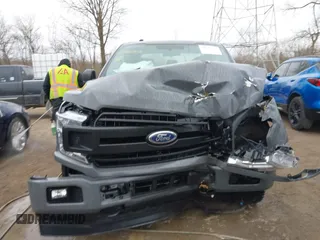 2018 Ford F-150 XL with VIN 1FTEX1EP1JFB25097, listed as a IAAI auction lot 41820009 with 137,138 mi miles and . Bid and sale history available at DreamBid. Image 12.
