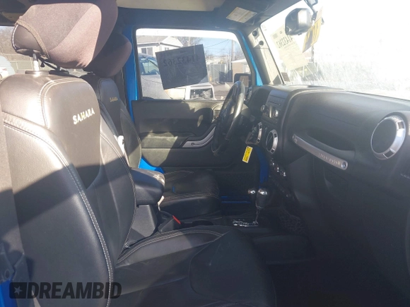 2016 Jeep Wrangler Sahara with VIN 1C4AJWBG7GL102208, listed as a IAAI auction lot 41432362 with 67,243 mi miles and . Bid and sale history available at DreamBid. Image 5.