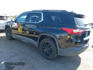 2019 Chevrolet Traverse LT Cloth z VIN 1GNEVGKW7KJ208656, wystawiony jako IAAI lot #42373422 z przebiegiem 132 863 mil mil oraz . Historia ofert i sprzedaży dostępna na DreamBid. Obrazek 3.