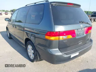 2003 Honda Odyssey EX with VIN 5FNRL18673B112958, listed as a IAAI auction lot 42172282 with 189,521 mi miles and . Bid and sale history available at DreamBid. Image 3.