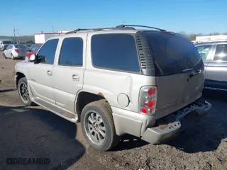 2005 GMC Yukon Denali with VIN 1GKEK63U45J192983, listed as a IAAI auction lot 41626897 with 294,072 mi miles. Bid and sale history available at carsss.com. Image 3.