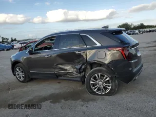 2020 Cadillac XT5 Premium Luxury FWD with VIN 1GYKNCRSXLZ126926, listed as a Copart auction lot 80432184 with 146,576 mi miles and Salvage Title. Bid and sale history available at carsss.com. Image 2.