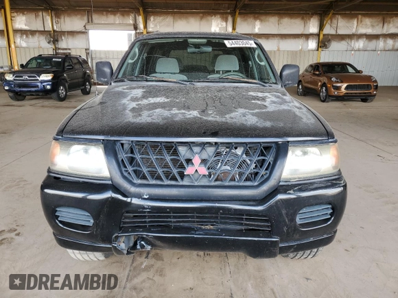2001 Mitsubishi Montero ES z VIN JA4LS21H11P003533, wystawiony jako Copart lot #54403045 z przebiegiem 241 477 mil mil oraz Szkoda całkowita • Salvage title. Historia ofert i sprzedaży dostępna na DreamBid. Obrazek 5.