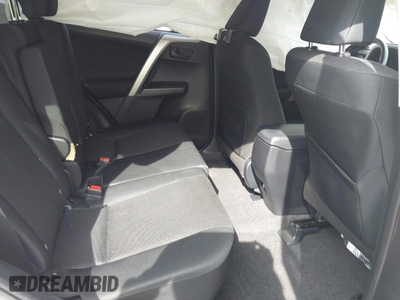 2017 Toyota RAV4 LE with VIN JTMZFREV3HJ143416, listed as a IAAI auction lot 41861981 with 115,241 mi miles and . Bid and sale history available at DreamBid. Image 8.