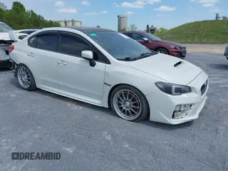 2017 Subaru WRX Premium with VIN JF1VA1E64H9828782, listed as a IAAI auction lot 40722034 with 86,554 mi miles. Bid and sale history available at carsss.com. Image 1.