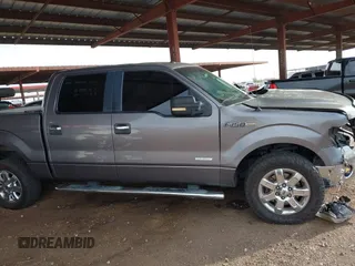 2014 Ford F-150 XL with VIN 1FTFW1CT8EKF75687, listed as a IAAI auction lot 41798973 with 119,972 mi miles. Bid and sale history available at carsss.com. Image 13.