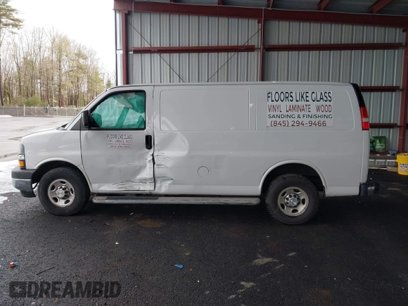 2018 Chevrolet Express Cargo Van with VIN 1GCWGAFG8J1905193, listed as a IAAI auction lot 41726804 with 83,690 mi miles. Bid and sale history available at carsss.com. Image 14.